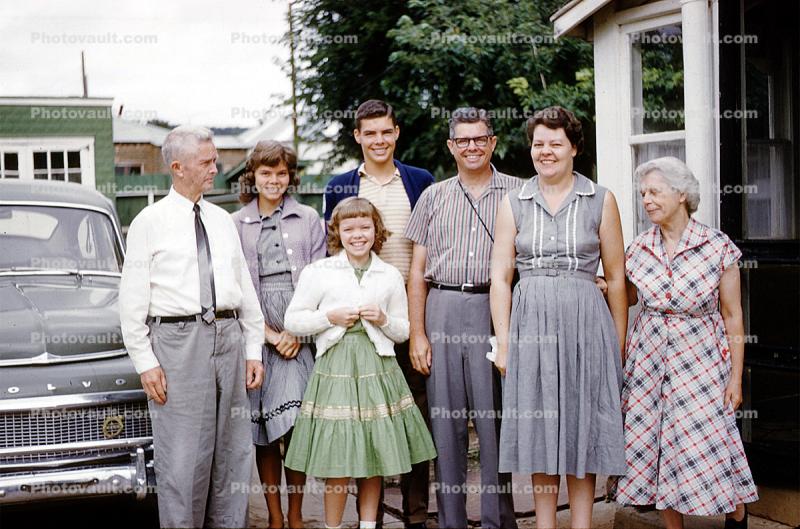 Volvo, Group, Women, Men, girls, smiles, shoes, dress, pants, 1960s