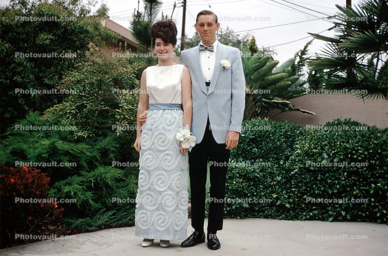Couple, corsage, backyard, Bouffant Hairdo, Woman, smiles, 1960s