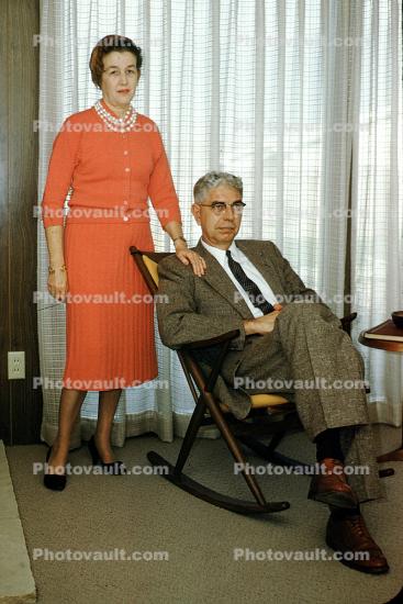 Woman, Man in Rocking Chair, Curtain, 1950s