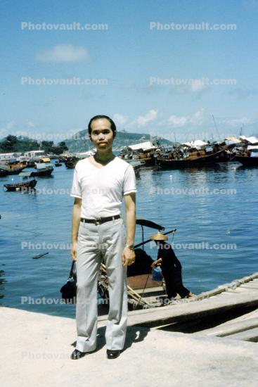 Sampans, harbor, Man, 1950s