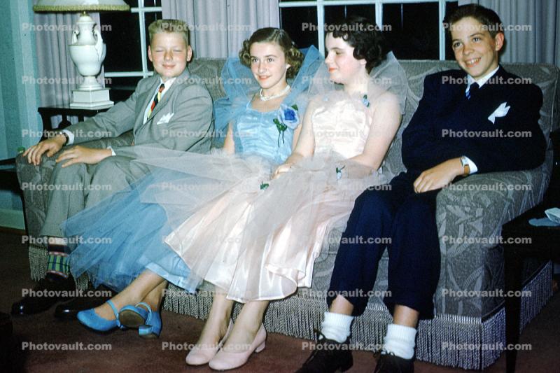 girls, boys, formal suit, sofa, couch, smiles, smiling, 1940s