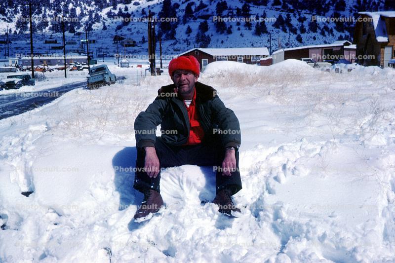 Man sits in the Snow
