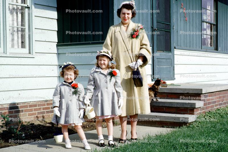 Coats, corsage, girls, smiles, cat, steps, Akron Ohio, 1950s