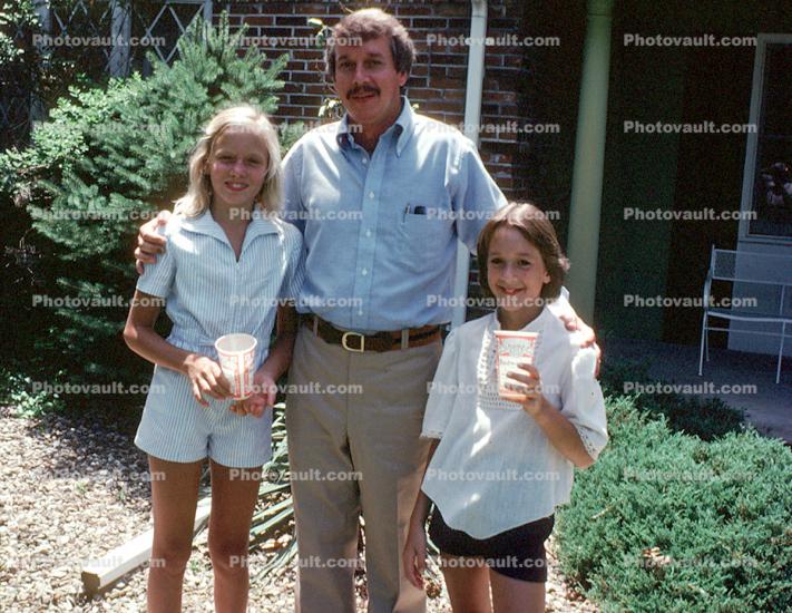 Father and his Daughters, 1980s