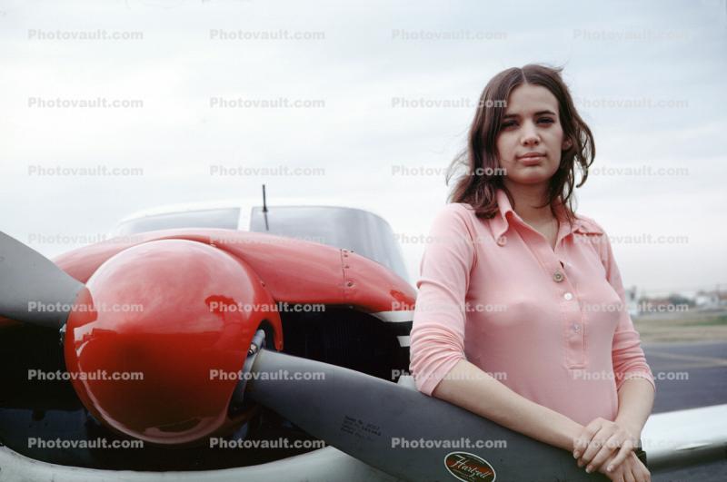 Girl leans on a propeller, 1960s