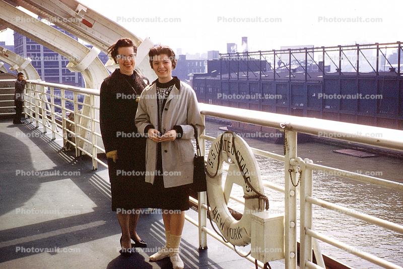 Women, coats, Ocean Liner Cruise, SS-United States, pier, harbor, smiles, August 1960, 1960s