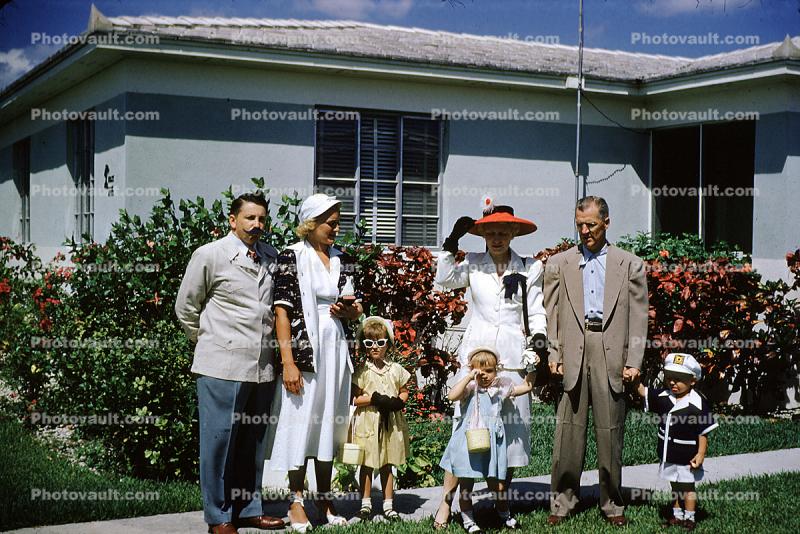 Family Group Portrait, girls, man, woman, front yard, home, house, 1950s