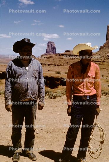 Native American Indians, cowboy hats, Monument Valley
