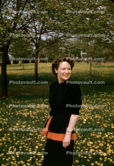 Smiling Lady, field of flowers, 1940s