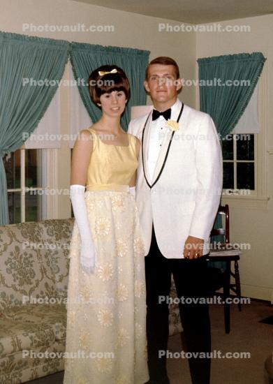 Woman and Man going out on a prom, suit, formal attire, flowers, 1960s