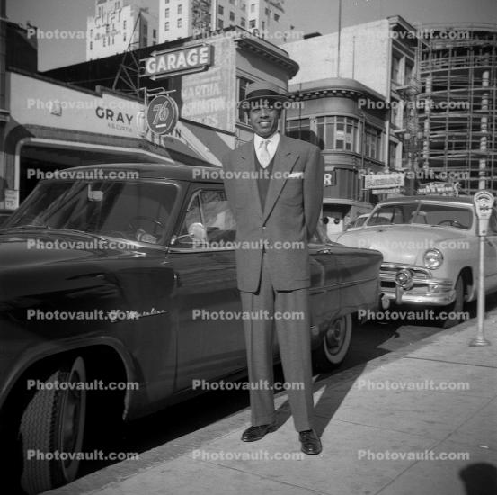 Man with his car, Ford Mainliner, 1950s