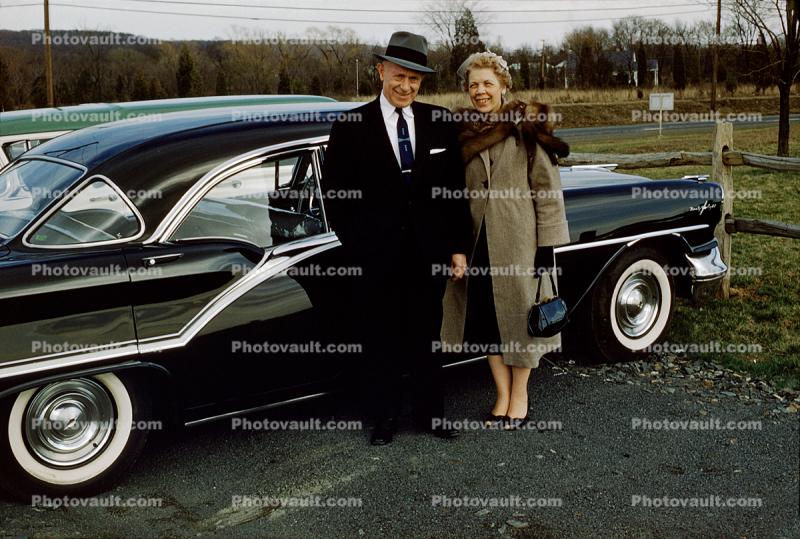Man and Woman, Husband and Wife, Coat, Mink Fur, 1957 Oldsmobile 98, 1950s