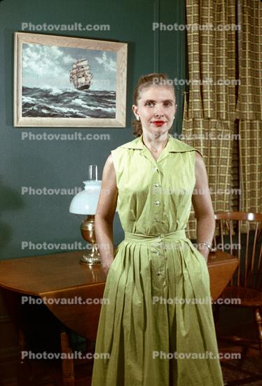 Wpman Standing, hands in pockets, dress, 1940s