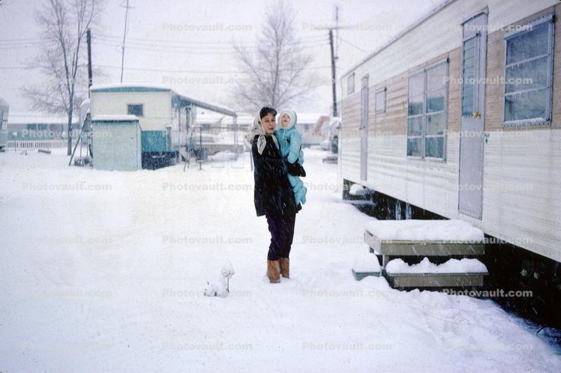 Woman with Child in the Snow, Ice, Cold, Winter, May 1964
