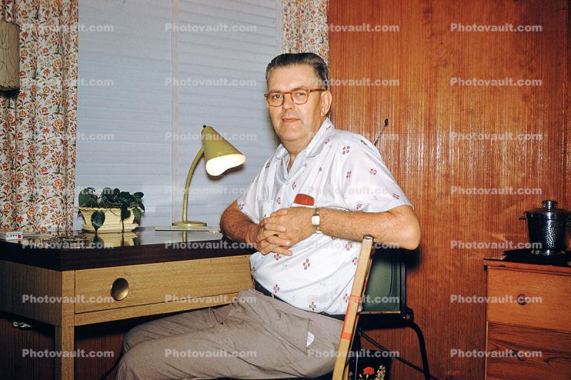 Man at his Desk, table light, August 1959
