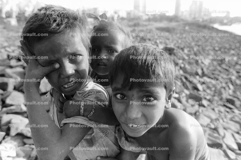 Girl, Boy, children picking through trash, slum, Fort Beach, Khroorow Baug