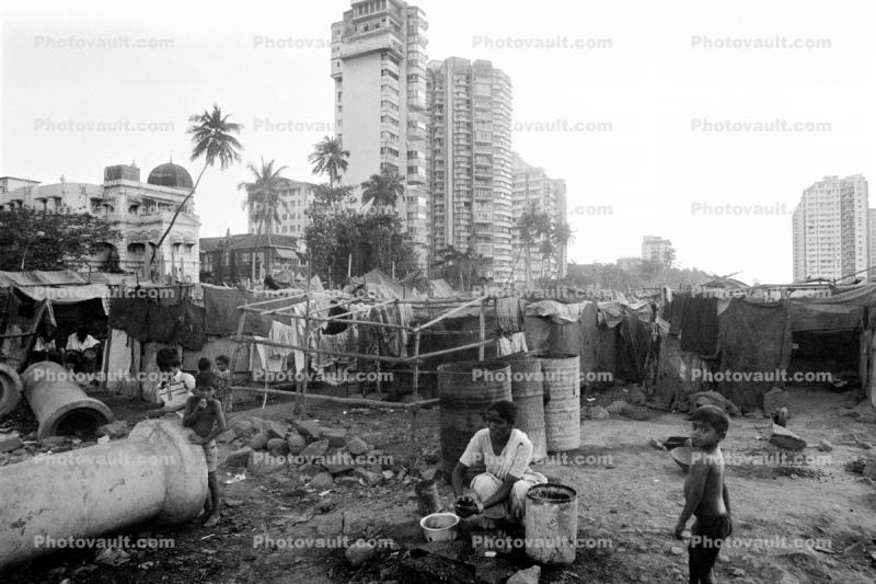 Mother Cooking Food, Shanty Homes, apartment buildings, slum, Mumbai, India
