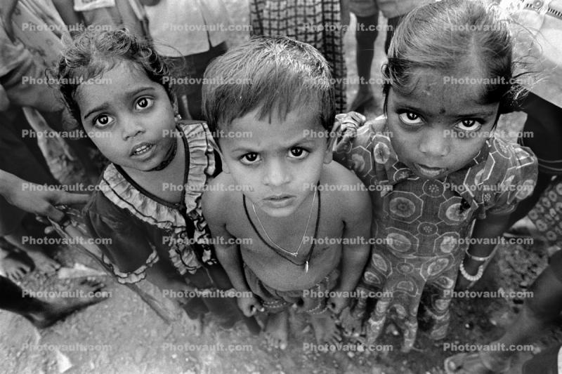 Girls and a Boy Gaze Deeply in the Future, Eyes, Slums, Mumbai, India