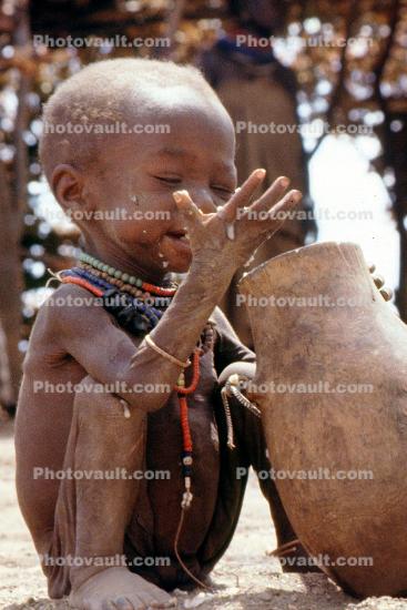Boy eating from a bowl, Lake Turkana, refugee, African Diaspora