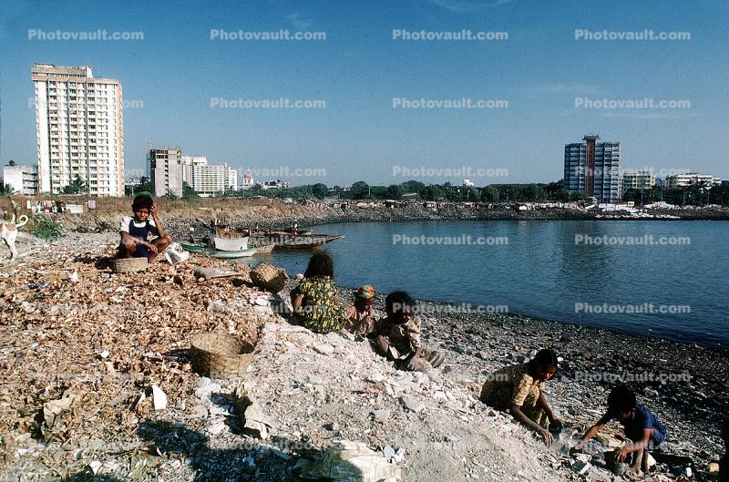 Children picking through trash, garbage, waste, Back Bay, Fort Beach