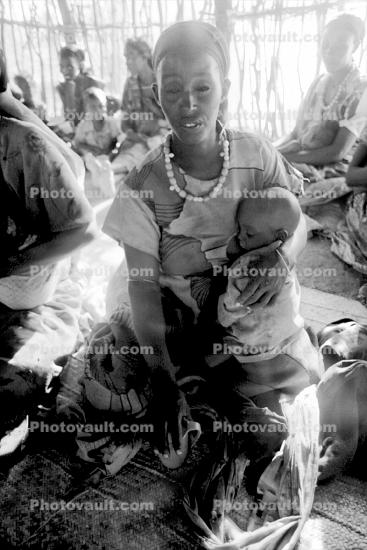 Woman with child, baby, Somalia Refugee Camp, African Diaspora, Refugee Camp, Somalia