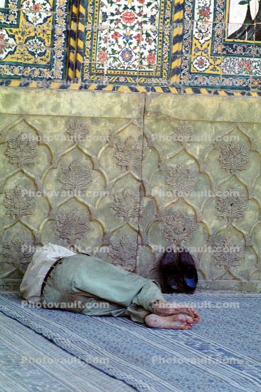 Man sleeping on the sidewalk, Iraq