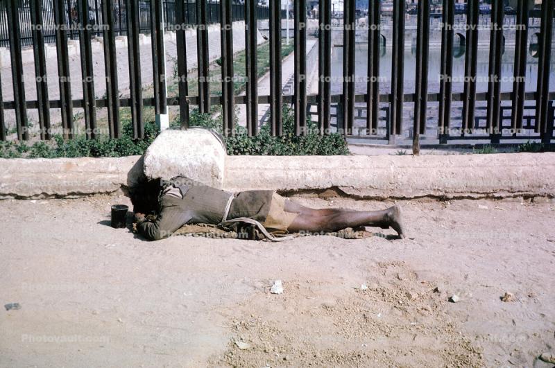 Man Sleeping on the sidewalk, Nepal