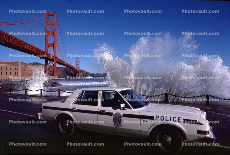 squad car, Fort Point, Golden Gate Bridge Splash