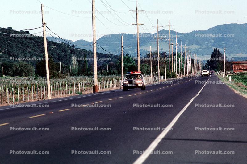 Squad car on highway, Silverado Trail, Napa Valley, CHP, California Highway Patrol