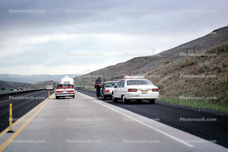 squad car, giving out a traffic ticket, Highway 395