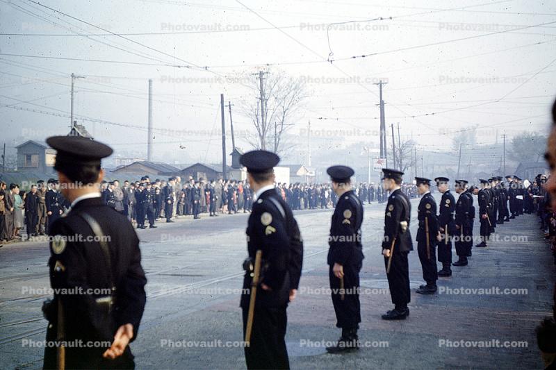 Police line up for General Macarthur leaving Tokyo, April 1951, 1950s