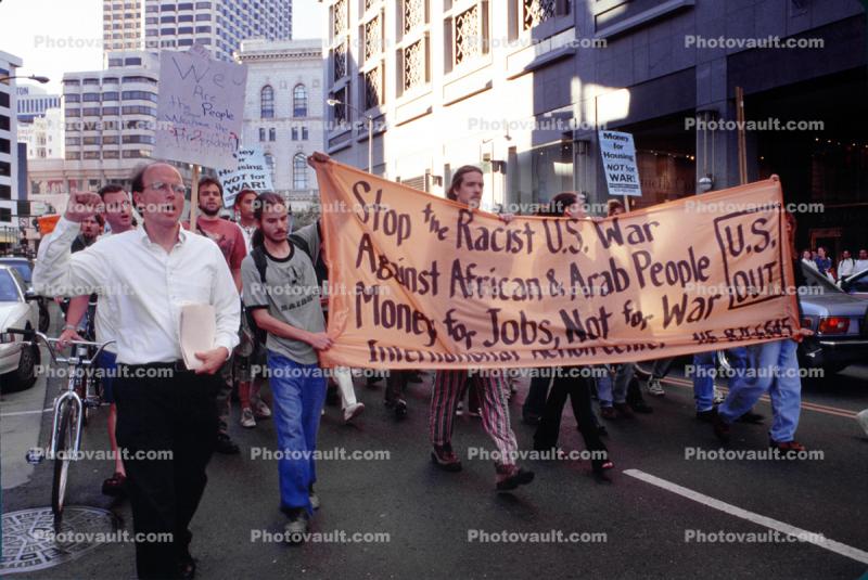 Stop the Racist War Against African & Arab People Banner