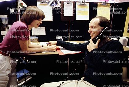 Man on the Phone, desk, cubicle, Woman, meeting, meet, converse, interacting, interaction, conversing, conversation, 1979, 1970s