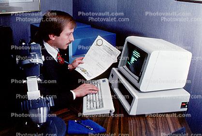 Microscope, Gem Tester computer, Gold Trader, gems, printer, Office, worker, employee, desk, people, broker, stocks and bonds, person, man, 1984, 1980s, businessman