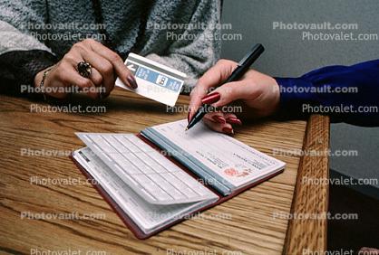 writing check, checkbook, pen, women, hands, fingernails, desk, 1980s