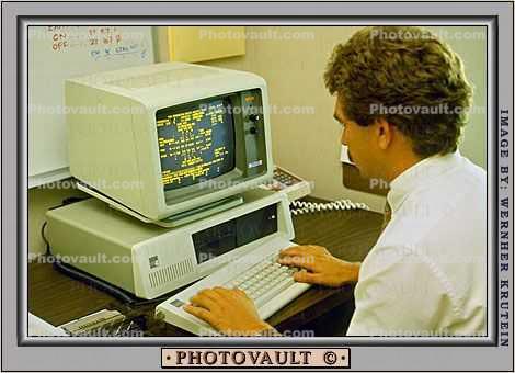 Paper, paperwork, desk, IBM Computer, Business Man, keyboard, hands, hair, Male, 1985, 1980s, businessman