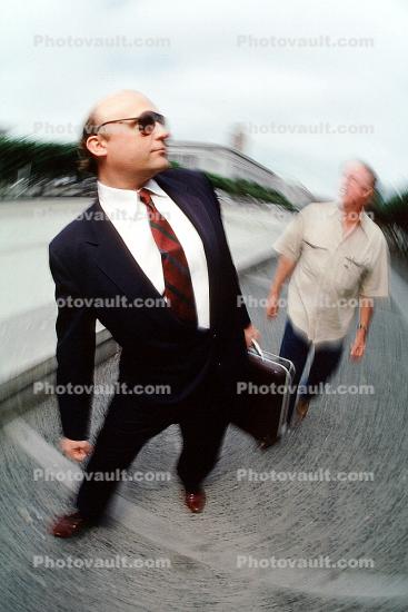 Businessman, briefcase, walking, politician, homeless man, anger, angry, yelling