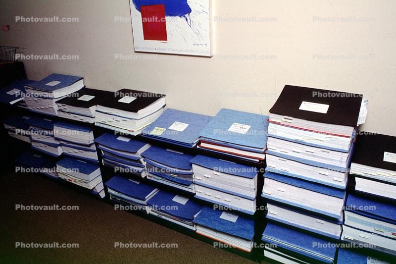 Binders, folders, paperwork, paper, stacks, blue