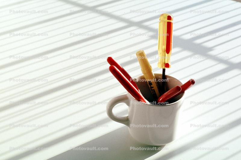 table, shadow, pencils, tools, pen holder