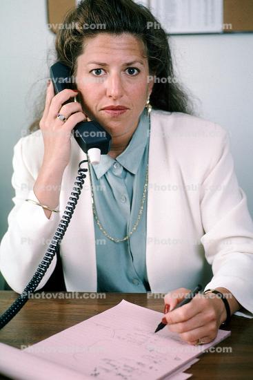 Business Woman, desk, phone, talking, conversing, connection, landline, writing pad, notes