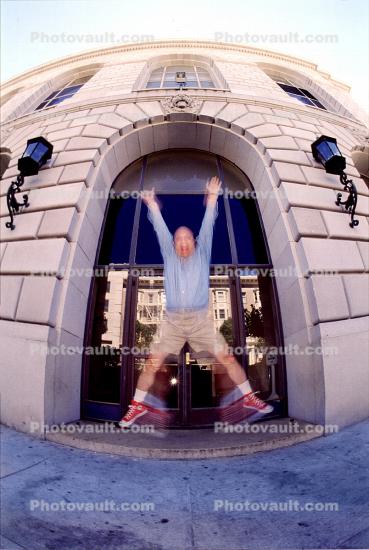 Man, Shorts, jumping, joy, success, happy, building, casual business man, red shoes, businessman