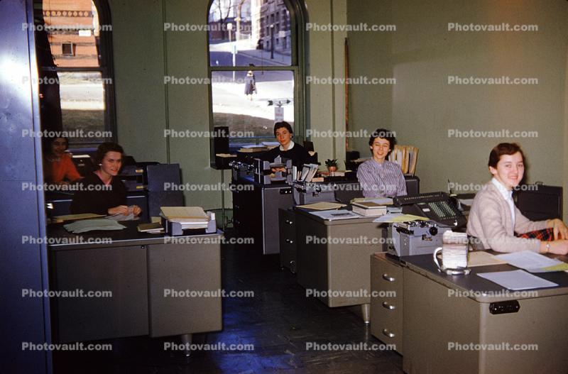 Women in an office, Desk, smiling, SMLA January 1956, 1950s