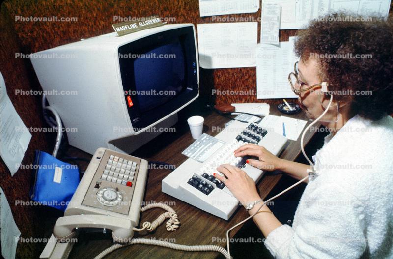Receptionist, monitor, keyboard, telephone receptionist, phone, woman, 1980s