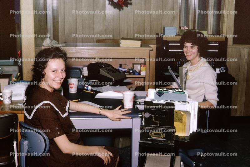 Women in a 1960s Office, desk, smiles, December 1966