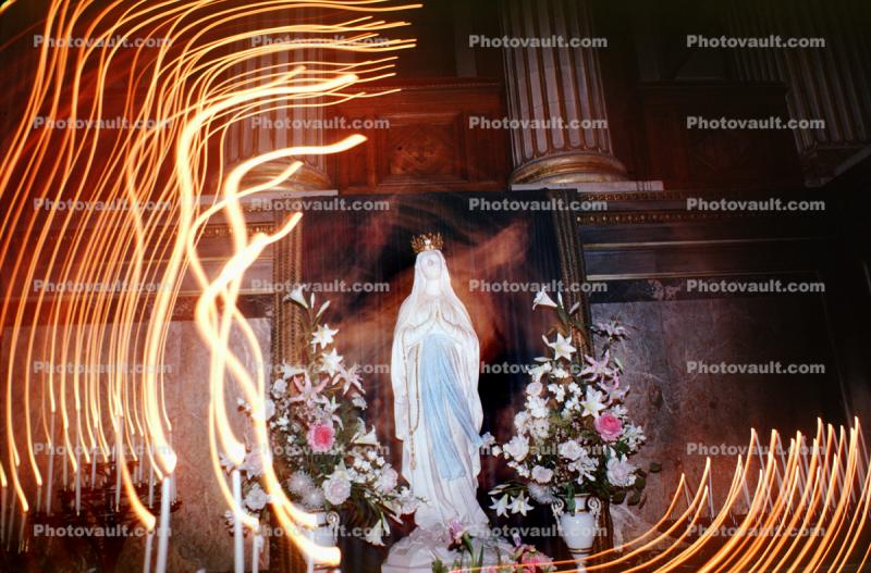 Mother Mary with candlelight swirl, La Madeleine Church, Eglise de la Madeleine