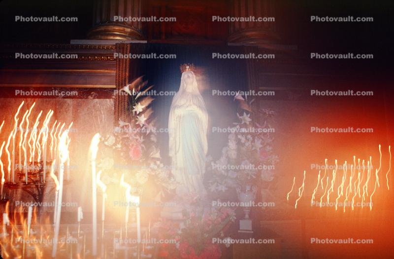 Mother Mary with candlelight swirl, La Madeleine Church