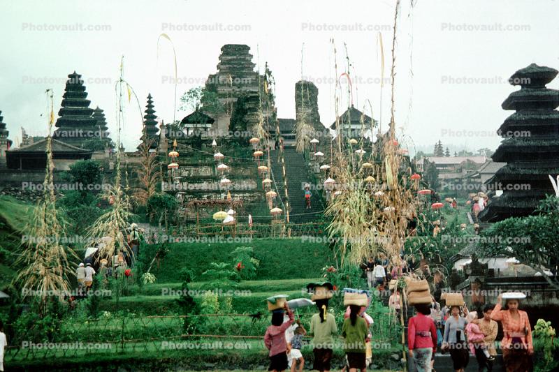 Pura Besakih, Hindu temple complex, Hinduism, people, buildings, Penjors, bamboo & palm leaf flags, Penjor