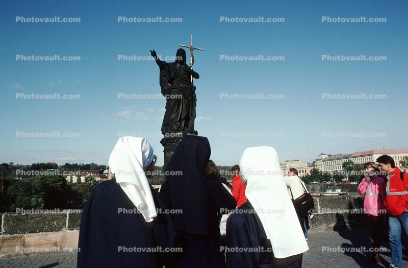 Nuns, Jesus Statue, cross, Saint Charles Bridge, Prague, Czech Republic