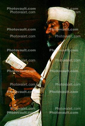 Christian Orthodox Monk reading the bible, Lalibela, Ethiopia