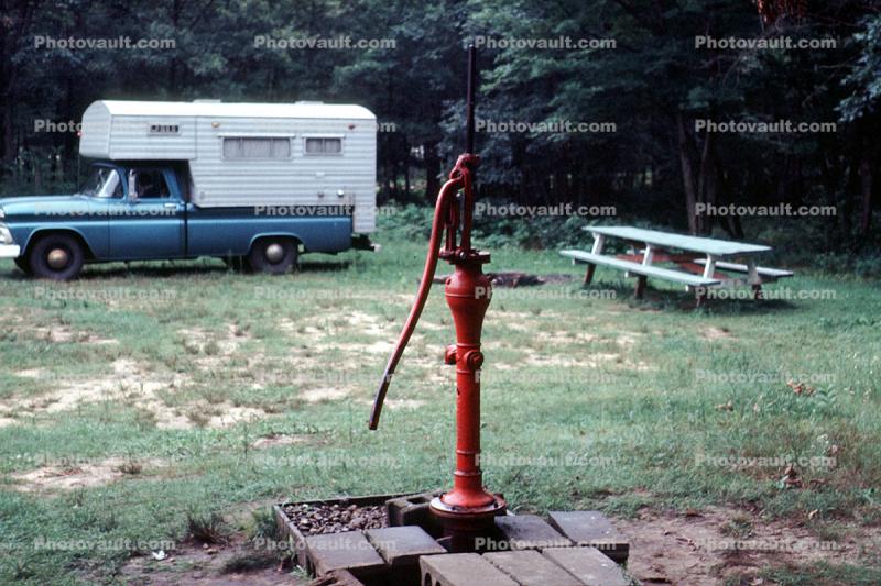 Water Hand Pump, Picnic Bench, Camper Shell, Pick up truck